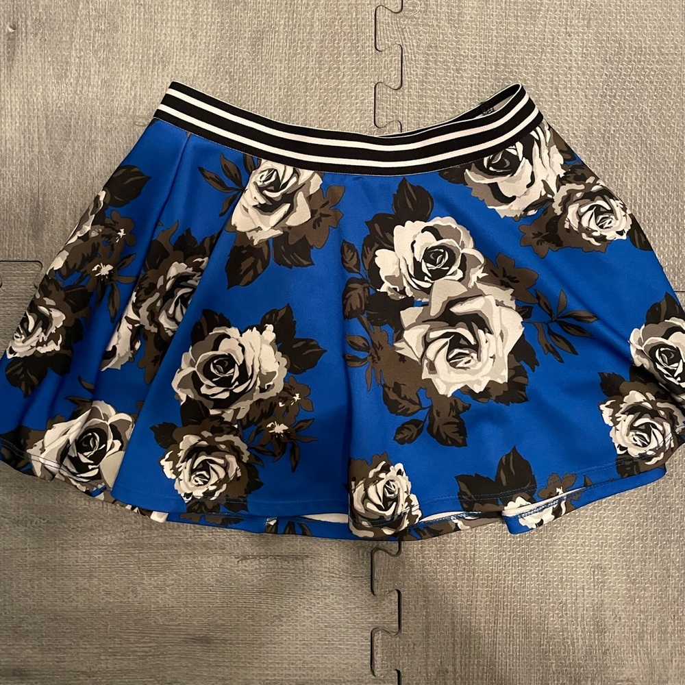 Blue Floral Justice Skirt. Size 10.